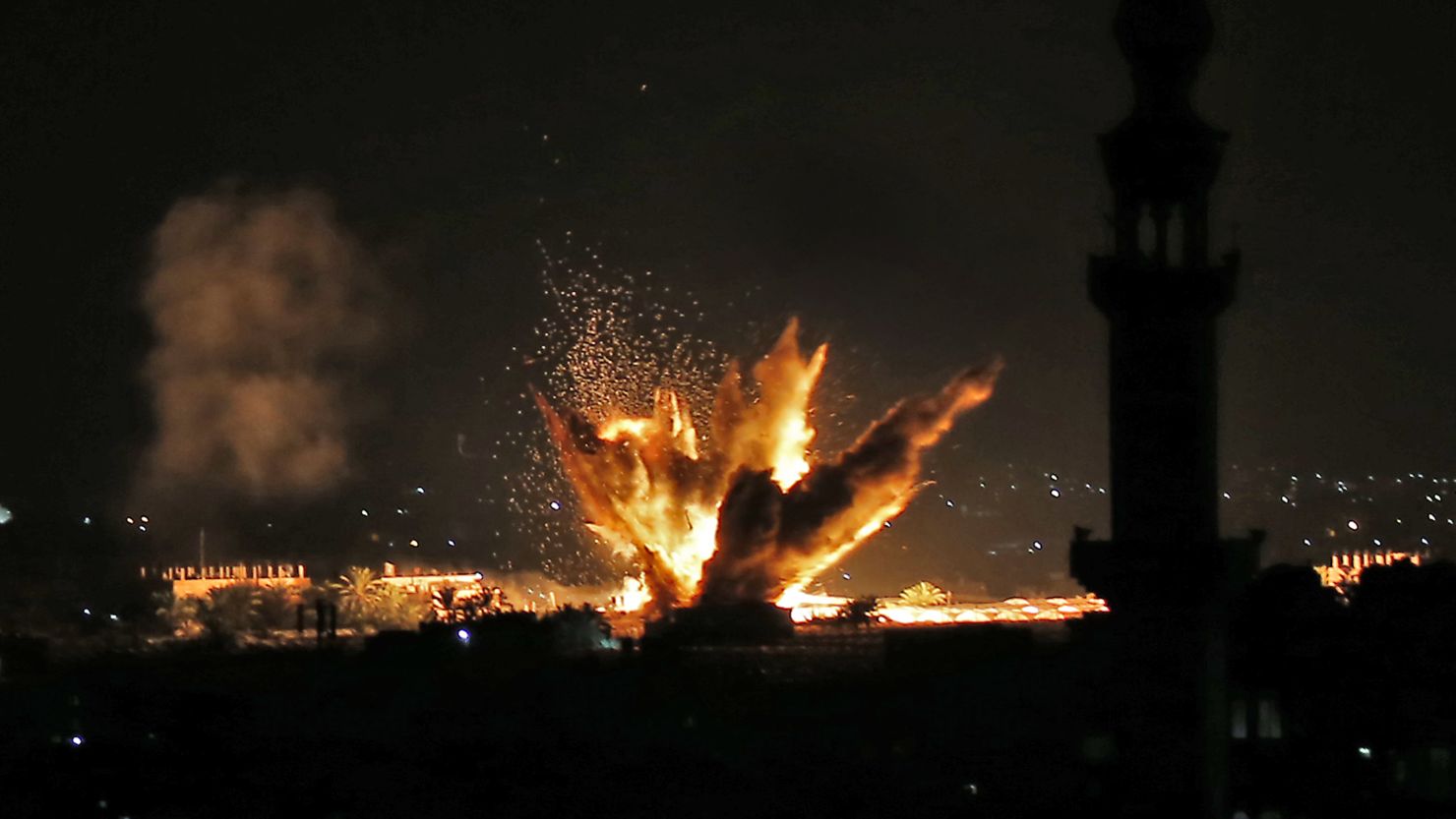 Fire and smoke billow following Israeli air strikes targeting Rafah in the southern Gaza Strip.