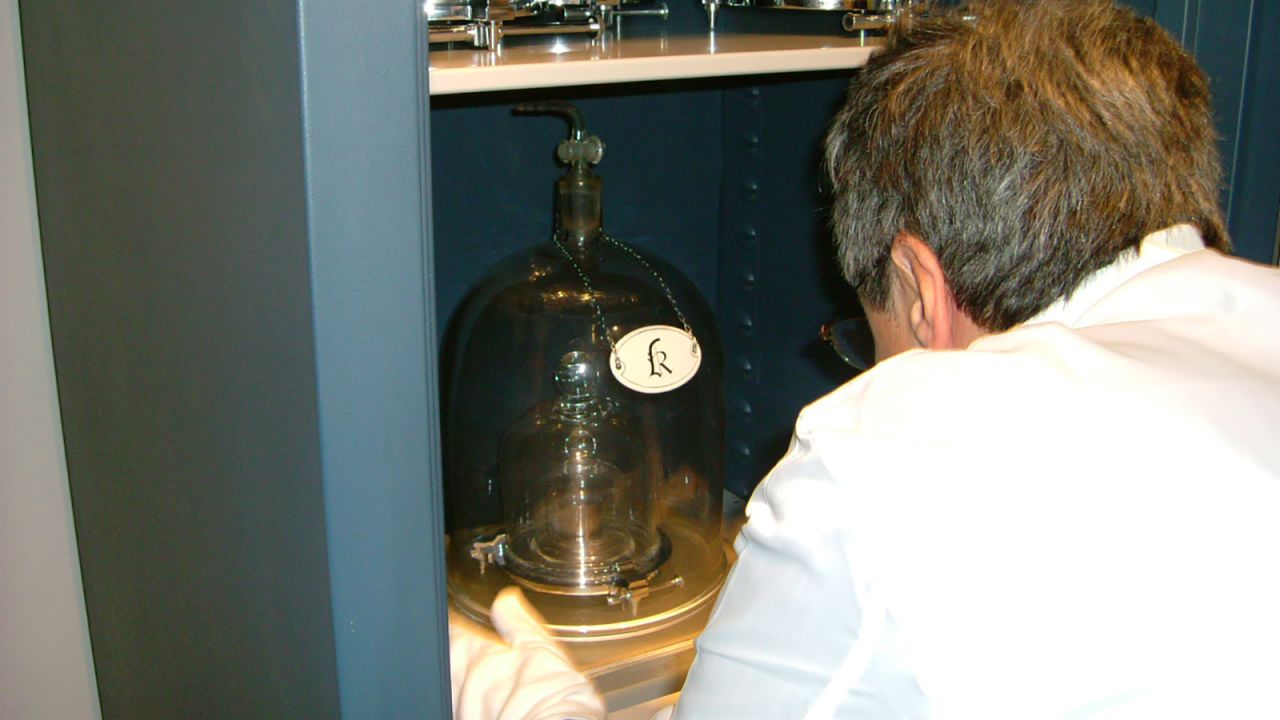 Into retirement. Le Grand K is placed in its safe.
