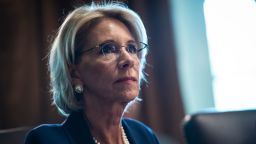 WASHINGTON, DC - AUGUST 16 : Secretary of Education Betsy DeVos listens as President Donald J. Trump speaks during a Cabinet meeting in the Cabinet Room of the White House on Thursday, Aug 16, 2018 in Washington, DC. 