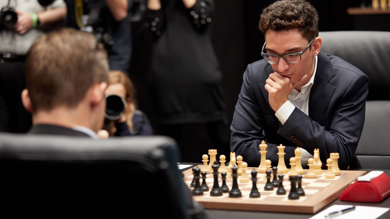 Caruana (right) plays world champion Carlsen over 12 matches in London this month.