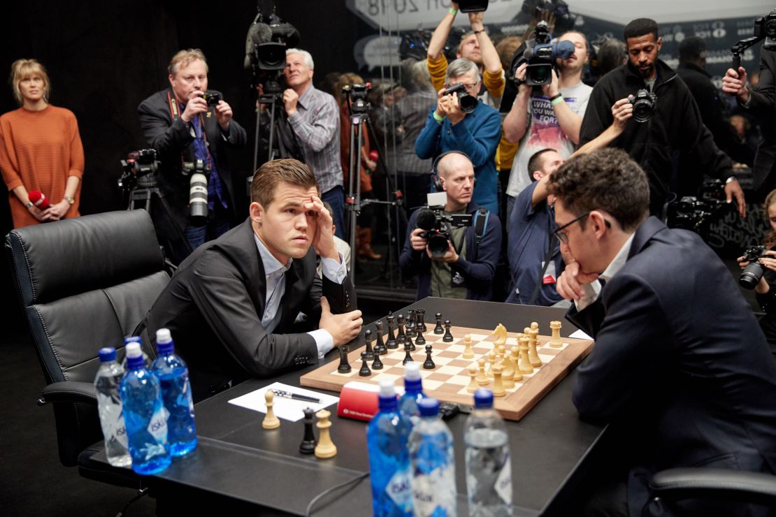 Magnus Carlsen (left) is reported to be worth more than $8M.