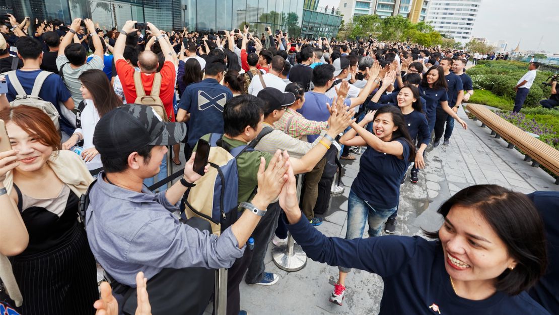 According to Apple, hundreds lined up overnight to be among the first to enter its new Thailand store. 