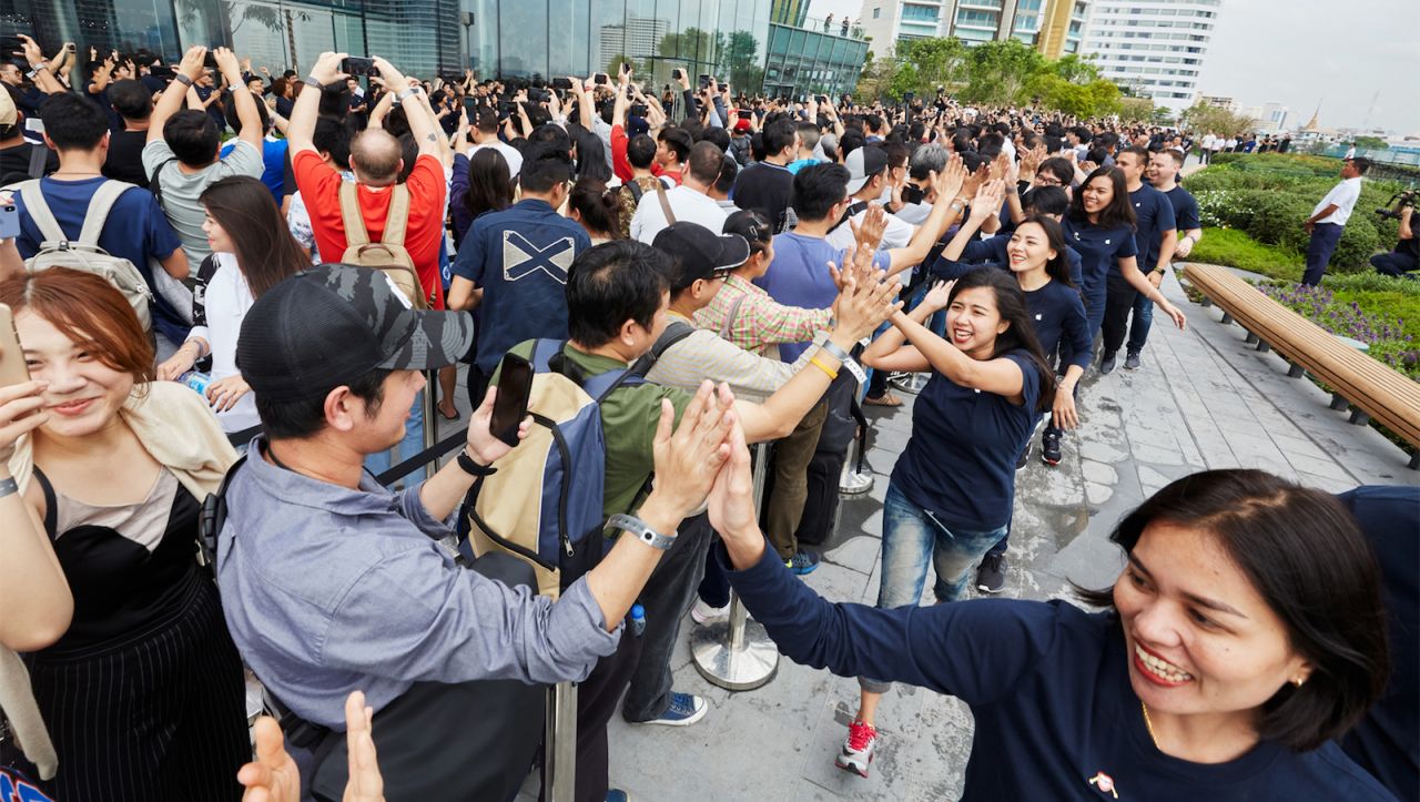 According to Apple, hundreds lined up overnight to be among the first to enter its new Thailand store. 