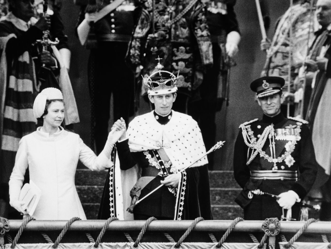 Queen Elizabeth II presents Charles to the people of Wales after his investiture as the Prince of Wales in July 1969.