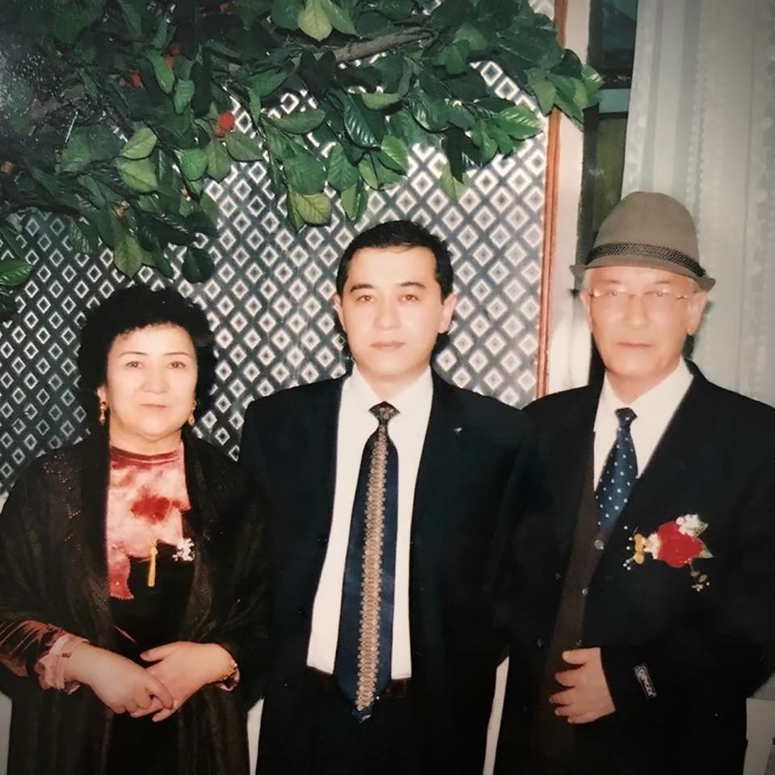 Uyghur journalist Gulchehra Hoja's brother and parents in an undated family photo