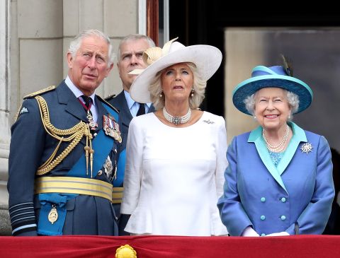 From left, Prince Charles, Prince Andrew, Duchess Camilla and Queen Elizabeth II watch a Royal Air Force flyover in July 2018.