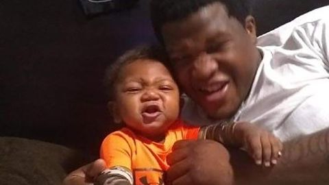 Jemel Roberson is seen with his young son, who is now 9 months old. 