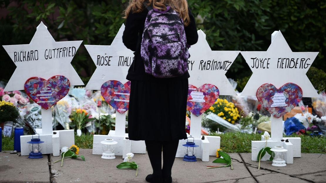 A woman mourns at a memorial outside the Tree of Life synagogue in Pittsburgh.