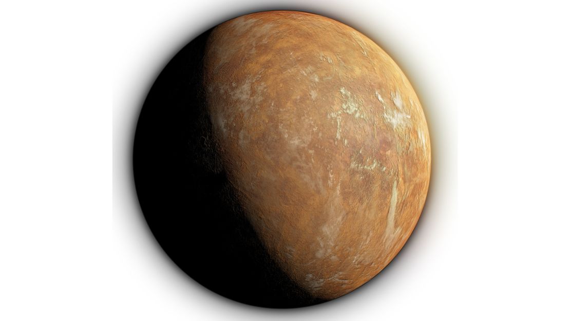 An artist's impression of the planet under the orange-tinted light from the star.