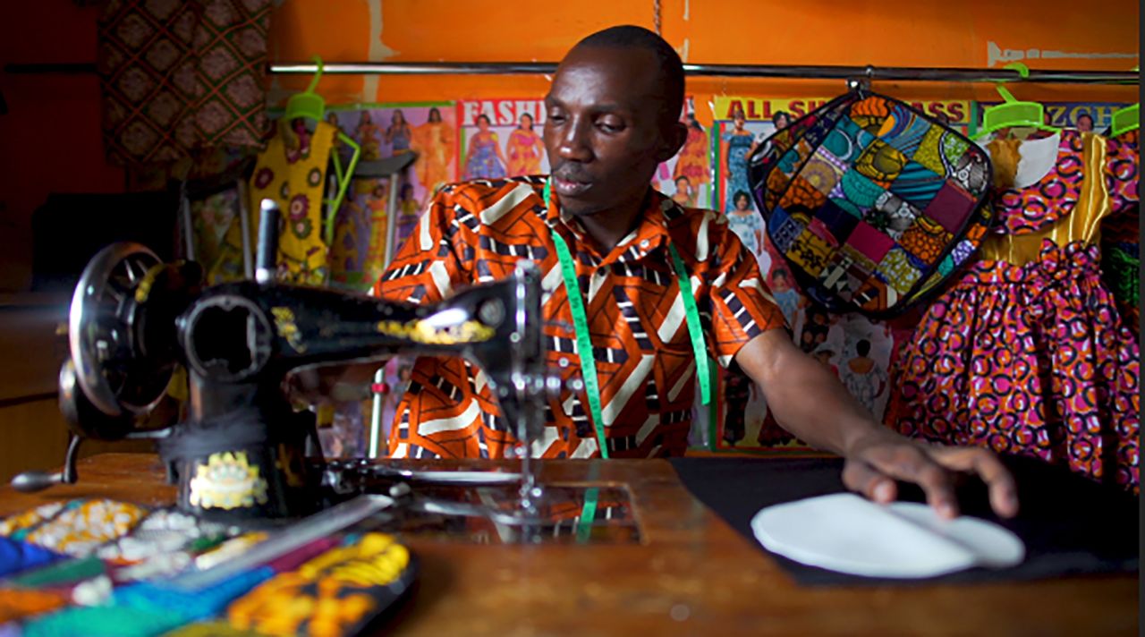 Stephen Kanyana, who survived polio, was one of the nine designers featured at the event in Entebbe, Uganda. 