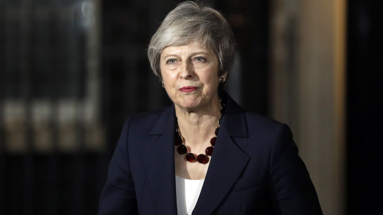 Britain's Prime Minister Theresa May delivers a speech outside 10 Downing Street in London, Wednesday, Nov. 14, 2018. British Prime Minister Theresa May says Cabinet agrees draft Brexit deal with European Union after 'impassioned' debate. (AP Photo/Matt Dunham)