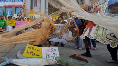 Thai villagers affected by the construction of the Xayaburi dam in Laos protest in front of the administrative court in Bangkok.