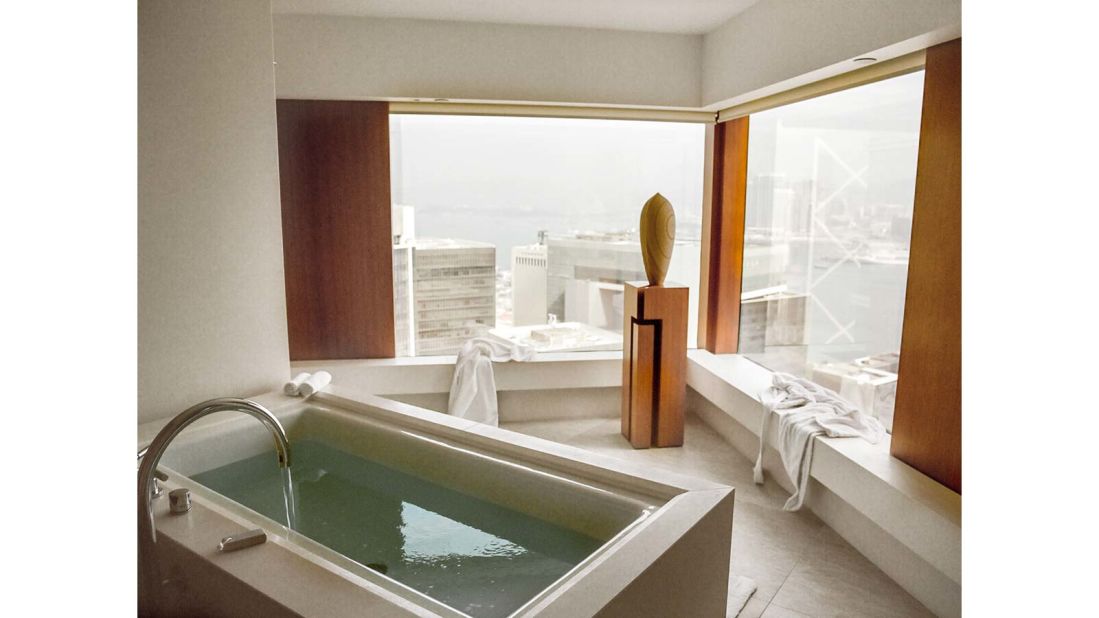 <strong>The Upper House (Hong Kong): </strong>Studio 70 Harbour View is Mr & Mrs Smith's recommendation for fans of a stunning skyline. The bathroom's centerpiece is a limestone-clad bath, but before you step out of the tub, remember the views go both ways. 