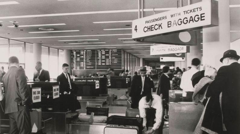 <strong>Changing times</strong>: In 90 years, the biggest change the airport's seen, according to Pattison, is the advent of the jet engine. "It just made everything twice as fast," she says. <em>Pictured here: the United Airlines baggage check in area at Terminal 7, at Los Angeles International Airport in 1965.</em>