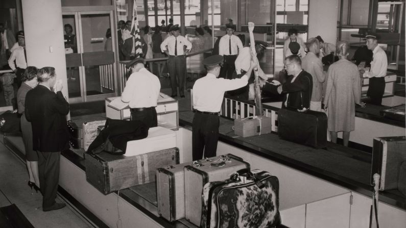 <strong>International contingent</strong>: During the Jet Age, bigger planes and better connections put LAX on the map. The international terminal was constructed in 1961. <em>Pictured here: In 1963, arriving international passengers show customs inspectors items they purchased overseas. </em>