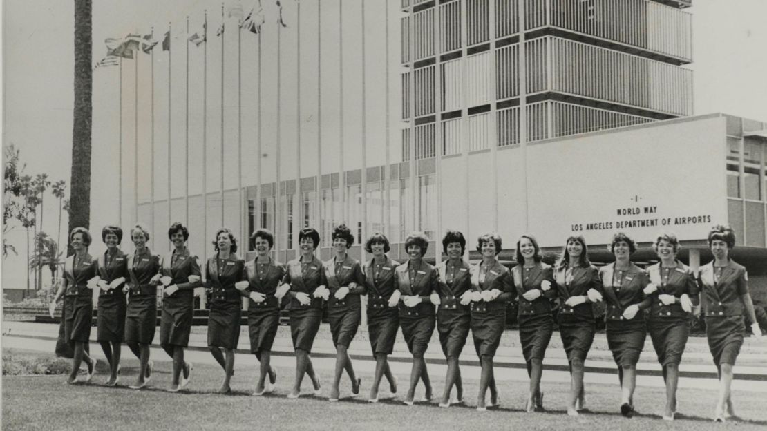This 1965 photograph from LAX depicts former flight attendants "grounded" after marriage and now working as tour guides.
