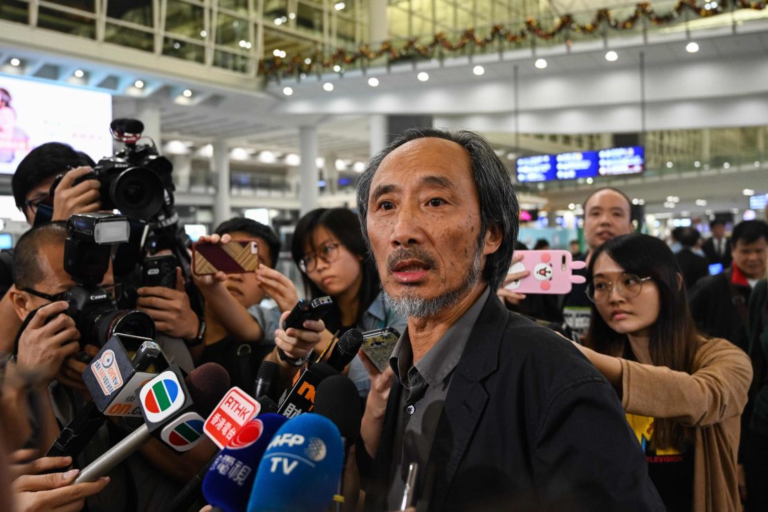 Chinese author Ma Jian speaks to the press upon his arrival at Hong Kong International Airport on November 9, 2018.