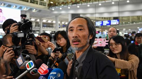 Chinese author Ma Jian speaks to the press upon his arrival at Hong Kong International Airport on November 9, 2018.
