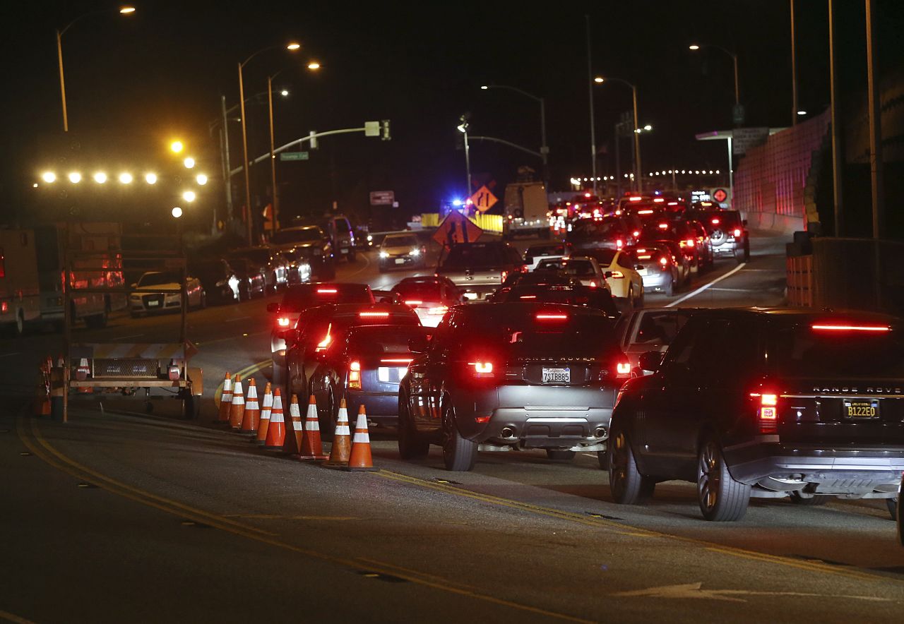 A long line of residents seeking to return to Malibu wait at a checkpoint on November 13 on Pacific Coast Highway after Woolsey Fire evacuation orders were lifted for the eastern portion of the city.
