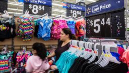 A customer browses clothing at a Walmart Inc. store in Secaucus, New Jersey, U.S., on Wednesday, May 16, 2018. Walmart is scheduled to release earnings figures on May 17. Photographer: Timothy Fadek/Bloomberg via Getty Images