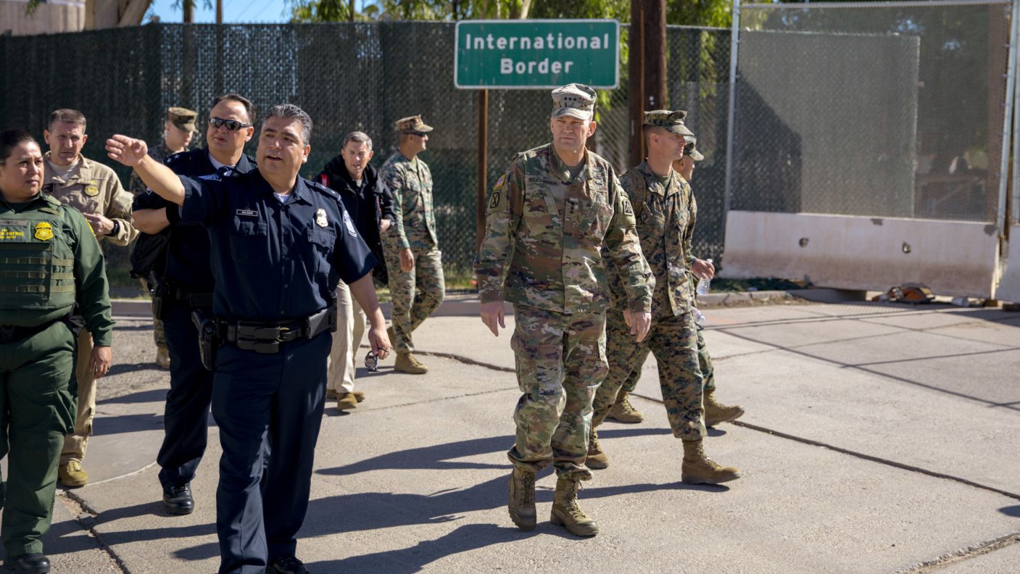 Calexico Port Director David Salazar guides US Army North Commander Lt. Gen. Jeffrey Buchanan on a tour of the Calexico West Port of Entry.  They are accompanied by Chief Patrol Agent of the US Border Patrol El Centro Sector Gloria Chavez and San Diego Director of Field Operations Pete Flores. November 13, 2018.  Photo by Ralph Desio.