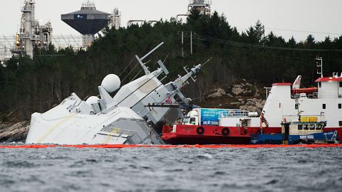The KNM Helge Ingstad pictured on November 10, 2018 in the Hjeltefjord near Bergen. The frigate, which was returning from NATO's Trident Juncture exercises, was evacuated after the collision with the Sola TS tanker, Norway's army said.