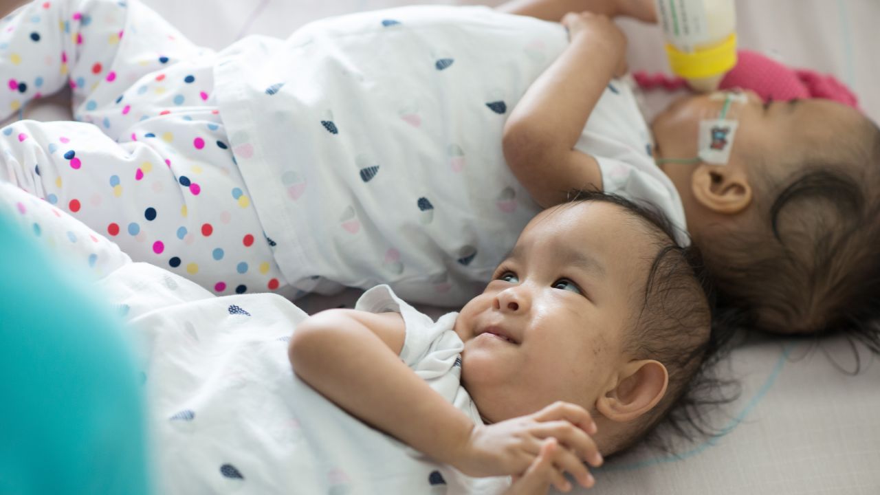 Bhutanese twins Dawa and Nima insist on being near each other despite being separated.