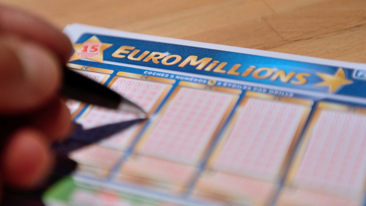 The search for the winner of the $97.5 million EuroMillions jackpot intensified after lottery organizers published the location where the winning ticket was bought. 