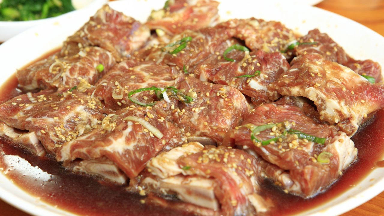 <strong>Galbi: </strong>Galbi, which means "rib," can technically come from pork and even chicken, but when you just say "galbi" sans modifiers, you're talking about thick slabs of meat marinated in a mixture of soy sauce, chopped garlic and sugar and grilled over a proper fire.
