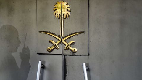 A shadow of a security member of the consulate is seen on the door of the Saudi Arabian consulate on November 1, 2018 in Istanbul. - Journalist Jamal Khashoggi was strangled as soon as he entered the Saudi consulate in Istanbul and his body was dismembered and destroyed as part of a premeditated plan, Turkey's chief prosecutor said on October 31, making details of the murder public for the first time. (Photo by OZAN KOSE / AFP) (Photo credit should read OZAN KOSE/AFP/Getty Images)