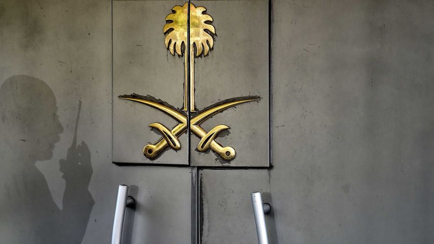 A shadow of a security member of the consulate is seen on the door of the Saudi Arabian consulate on November 1, 2018 in Istanbul. - Journalist Jamal Khashoggi was strangled as soon as he entered the Saudi consulate in Istanbul and his body was dismembered and destroyed as part of a premeditated plan, Turkey's chief prosecutor said on October 31, making details of the murder public for the first time. (Photo by OZAN KOSE / AFP)        (Photo credit should read OZAN KOSE/AFP/Getty Images)