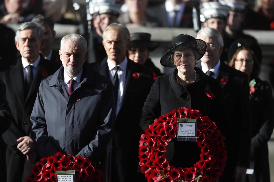 May stands next to Labour Party leader Jeremy Corbyn at a Remembrance Day ceremony in London in November 2018. Behind them, from left, are former Prime Ministers Gordon Brown and Tony Blair.