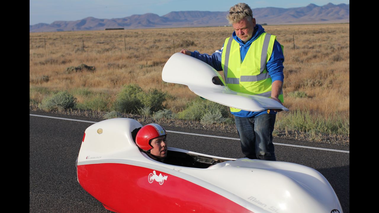 Russell Bridge, riding the Milan SL, shows how custom-built aerodynamic shells reduce wind resistance.