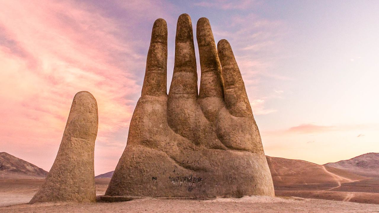 <strong>An imposing interruption: </strong>At 36 feet high, the "Hand of the Desert" makes for a startling change in the desert landscape.