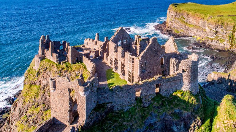 <strong>Dunluce Castle (County Antrim, Northern Ireland) -- before: </strong>Dunluce Castle in County Antrim in Northern Ireland was built circa 1500. Less than 150 years later it was already abandoned -- legend says that the castle's kitchen collapsed over the cliff edge and into the crashing waves below.