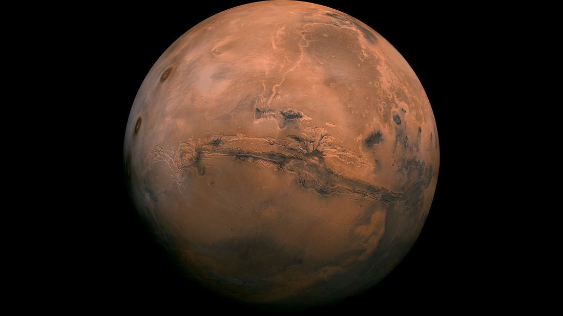 This perspective of Mars' Valles Marineris hemisphere, from July 9, 2013, is actually a mosaic comprising 102 Viking Orbiter images. At the center is the Valles Marineris canyon system, over 2,000 kilometers long and up to 8 kilometers deep. 