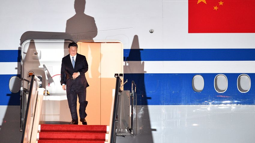 China's President Xi Jinping walks down the stairs of his plane upon arrival at Port Moresby International Airport on November 15, 2018, ahead of Asia-Pacific Economic Cooperation (APEC) Summit. (Photo by Saeed KHAN / AFP)        (Photo credit should read SAEED KHAN/AFP/Getty Images)