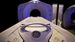 A General Electric Co. logo is seen on a Discovery CT750 HD CT scan machine as it sits on display prior to a news conference in New York, U.S., on Wednesday, Oct. 21, 2009. General Electric Co., the world's biggest maker of medical imaging equipment, is starting a $250 million venture capital fund to invest in health-care diagnostics companies, Jeff Immelt, the company's chief executive officer, said today. Photographer: Daniel Acker/Bloomberg