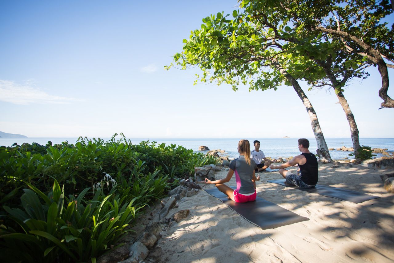 <strong>Sunrise yoga: </strong>Resort activities include Thai boxing, cooking class and yoga as well as plenty of non-motorized water sports like snorkeling, sailing and stand-up paddle boards. 