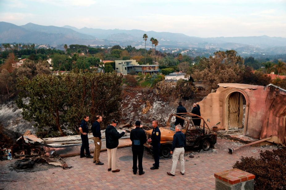 President Donald Trump visits a neighborhood impacted by the Woolsey Fire in Malibu, California, on November 17. 