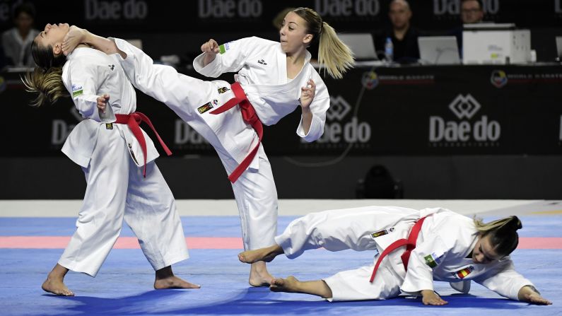 Spain's Lidia Rodriguez, Marta Garcia and Raquel Roy compete in the female team Kata final during the 24th Karate World Championships in Madrid, Spain on November 11.