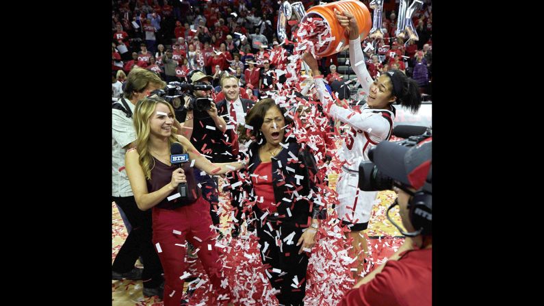 Rutgers forward Stasha Carey pours confetti on Rutgers coach C. Vivian Stringer after the Scarlet Knight's 73-44 victory over the Central Connecticut Blue Devils in Piscataway, New Jersey on November 13. The win was the 1,000th of Stringer's career, making her only the sixth women's coach in NCAA history to reach that mark.