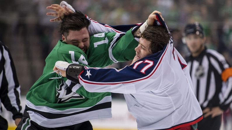 Dallas Stars left wing Jamie Benn fights Columbus Blue Jackets right wing Josh Anderson during the first period of a November 12 game in Dallas, Texas.