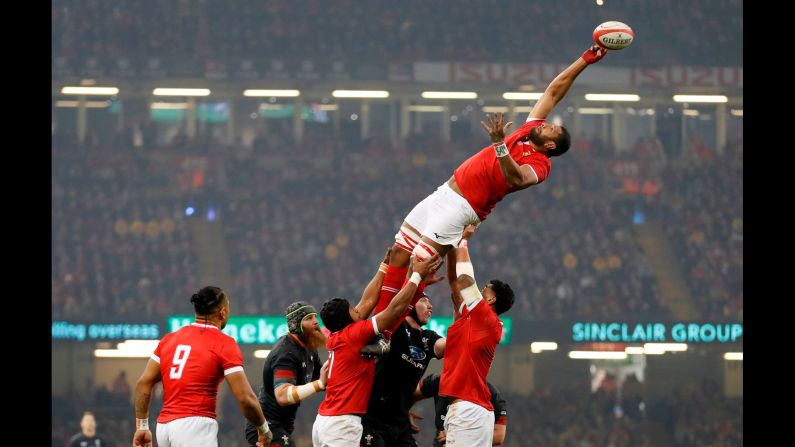 Tonga's Steve Mafi reaches for the ball during a match between Wales and Tonga at Principality Stadium in Cardiff, United Kingdom on November 17.