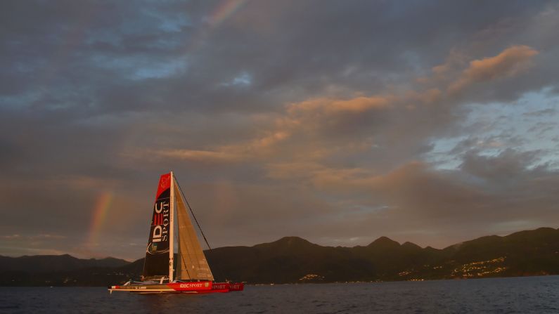 French skipper Francis Joyon sails off the coast of Guadeloupe before crossing the finish line of the Route du Rhum solo sailing race on November 11.