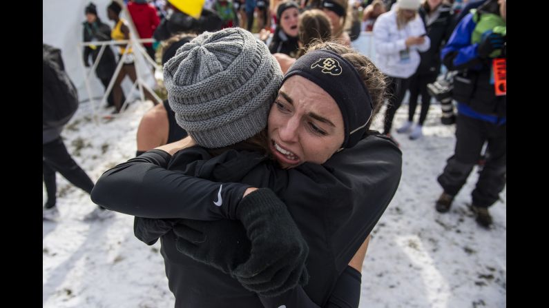 Colorado senior Dani Jones receives a hug from her mother after winning the NCAA cross country championship individual title at Thomas Zimmer Championship Course on November 17 in Verona, Wisconsin. The Colorado women won both the team and individual titles for the first time since 2000.