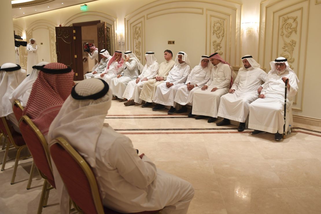 Salah Khashoggi (third from the right) and his relatives receive mourners at an events hall in the Saudi coastal city of Jeddah on November 16, 2018. 