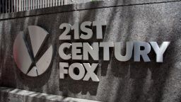 FILE - This June 14, 2018, file photo shows the 21st Century Fox logo outside its New York office. The Walt Disney Co. on Wednesday, June 27, 2018, won U.S. antitrust approval for its $71.3 billion bid for Twenty-First Century Fox's entertainment assets.