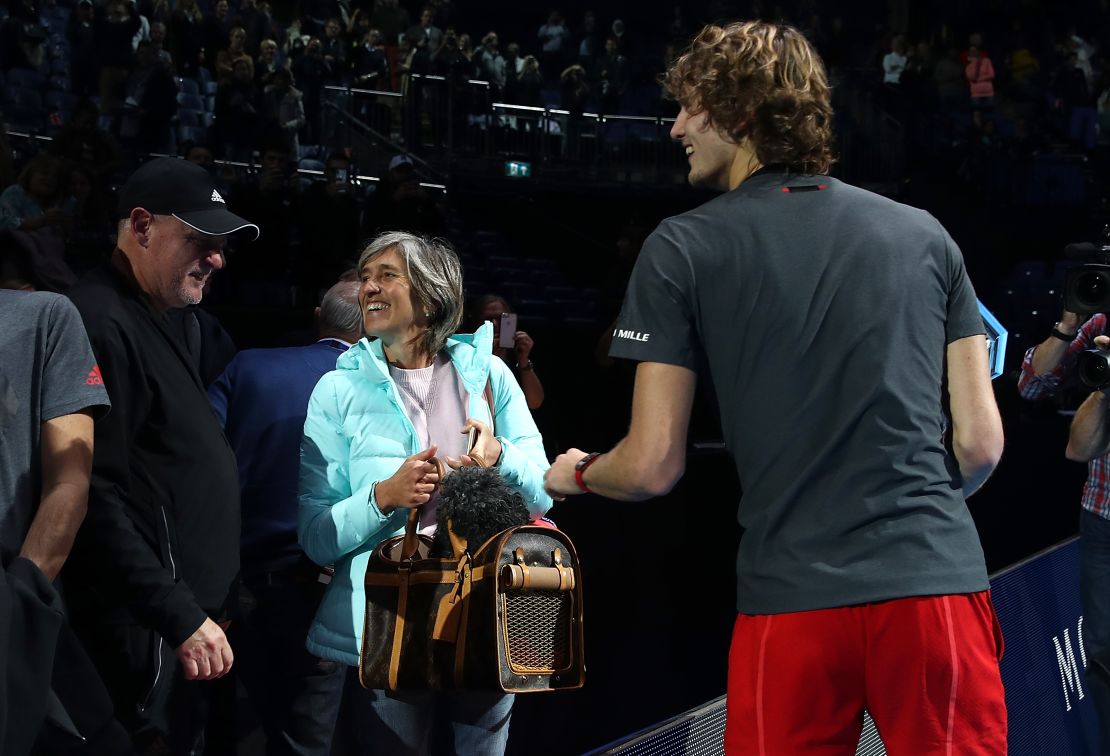 Zverev greets his parents (and dog Lovik) after winning the ATP Finals.