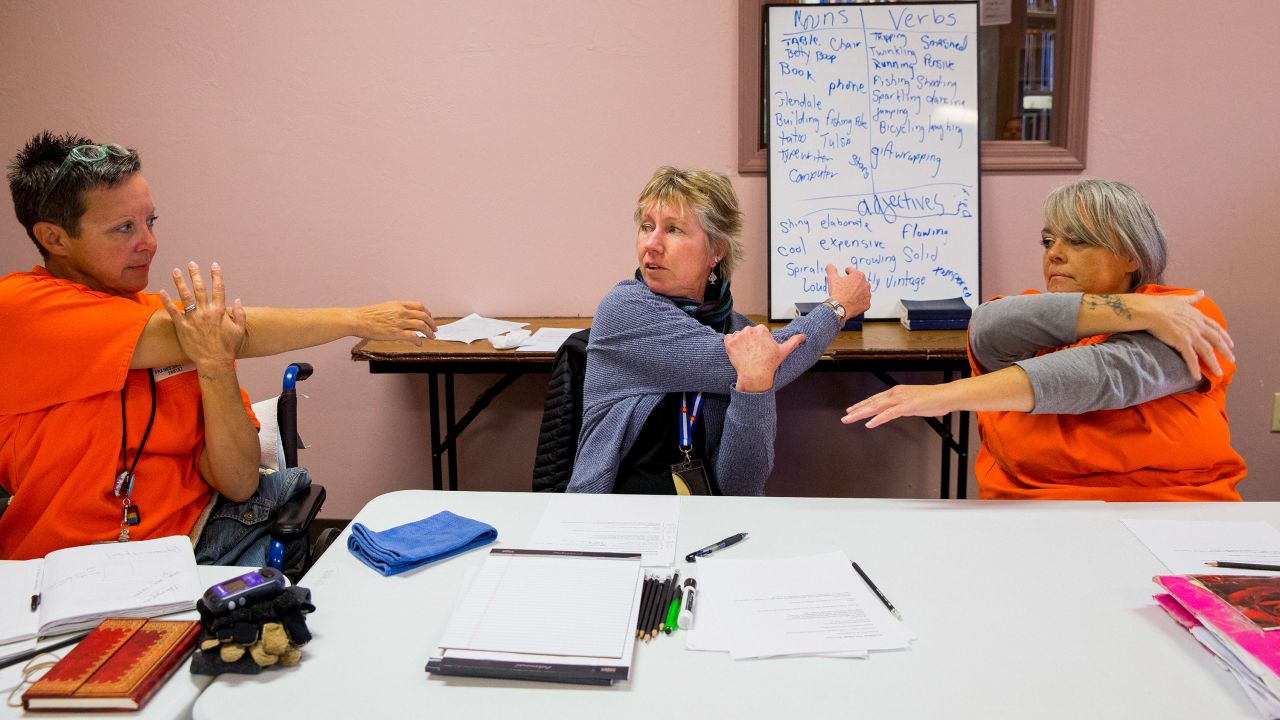 While working on her graduate school thesis, Stackable was surprised to learn her home state of Oklahoma has the highest rate of female incarceration in America. Here, prisoners meditate and stretch before their creative writing class with Stackable. "It's a sacred place where you can write, and you can feel free to share your writing and trust people in a place where no one trusts anybody," Stackable says.